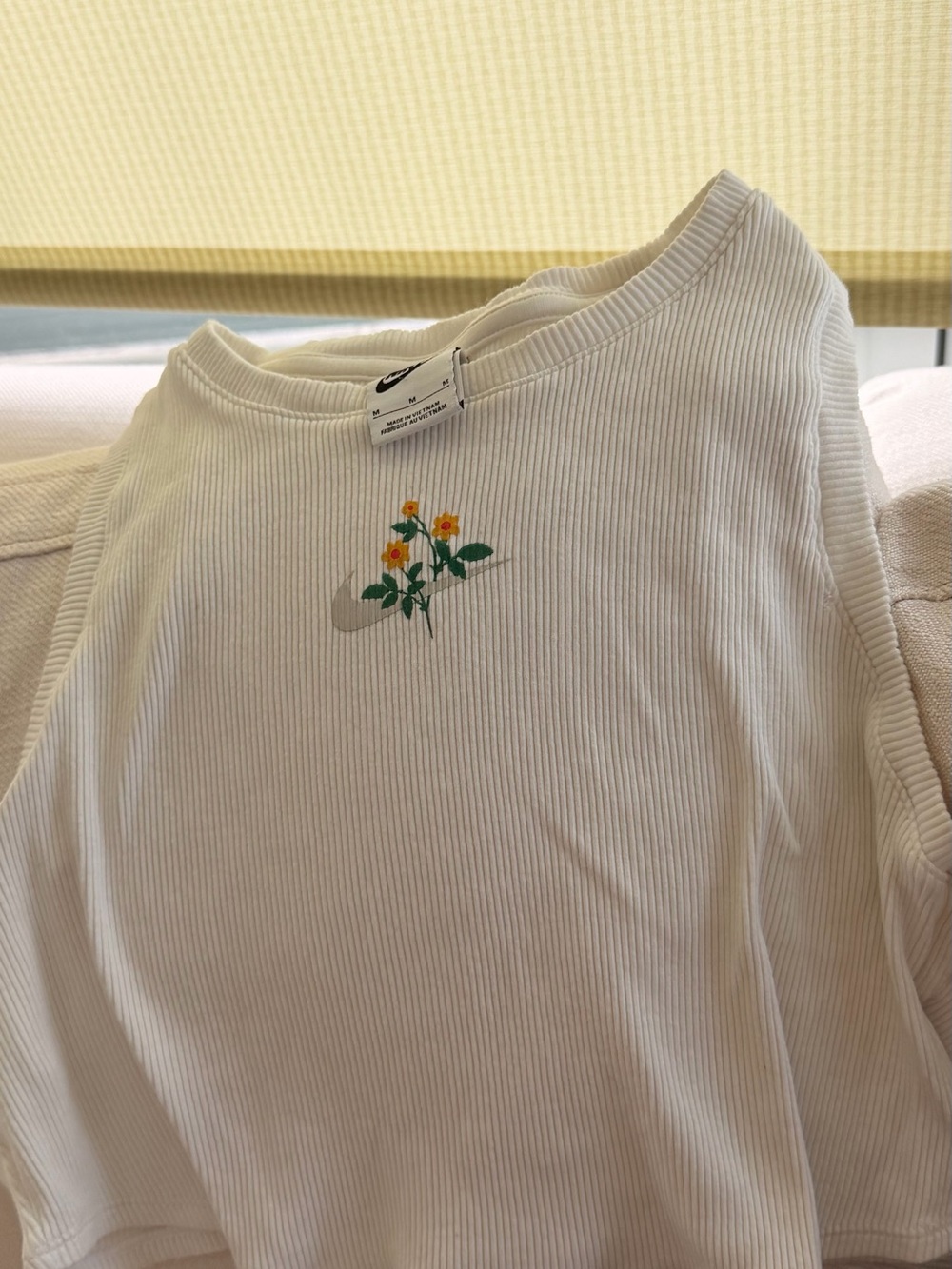 Nike White Ribbed crop Top with Yellow Floral Logo